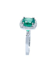 1.71 ct. Colombian emerald cushion cut halo diamond ring in 14K white gold.