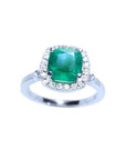 Women's ring with a cushion cut natural colombian emerald with a halo diamond, white gold.