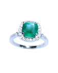Women's ring with a cushion cut natural colombian emerald with a halo diamond, white gold.