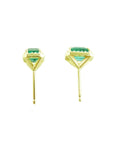 Pair of yellow gold emerald stud earrings, underside view, push backs system.