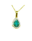 Gold pendant with a natural teardrop colombian emerald on a topside position view.