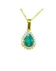 Gold pendant with a natural teardrop colombian emerald on a topside position view.