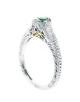This emerald ring position displays the top and side profile  perspective.