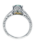 This bridal design natural oval cut colombian emerald ring in white gold shows the top and gallery profile