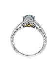 Oval-cut Colombian emerald ring in 14K white gold with diamond accents and intricate band engraving.