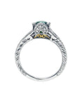 Oval-cut Colombian emerald ring in 14K white gold with diamond accents and intricate band engraving.