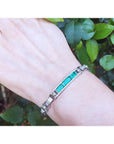 May's birthstone emerald bracelet and princess cut diamonds white gold