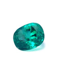 GIA certified 3.13 carat natural Colombian emerald with a cushion cut and vivid bluish-green hue.