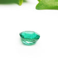 GIA certified loose natural Colombian emerald cushion cut, underside girdle and pavilion view