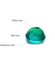 2.06 carat cushion cut Muzo Colombian emerald with medium-deep bluish-green color.