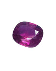 1.18 carat loose natural ruby gemstone with a cushion cut and vibrant red hue.