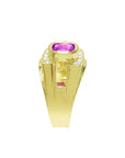 Men's 18K yellow gold ring with a bezel-set purplish-pink cushion-cut sapphire and diamond accents.