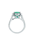 A 14k white gold emerald ring, top and gallery lateral view.