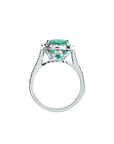 Cushion cut 3.92 ct. deep bluish-green natural emerald ring with diamond halo in 14K white gold.