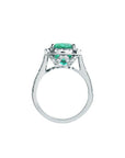 Cushion cut 3.92 ct. deep bluish-green natural emerald ring with diamond halo in 14K white gold.