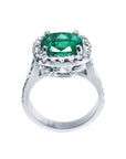 A white gold cushion cut emerald ring lateral side, top and gallery view.