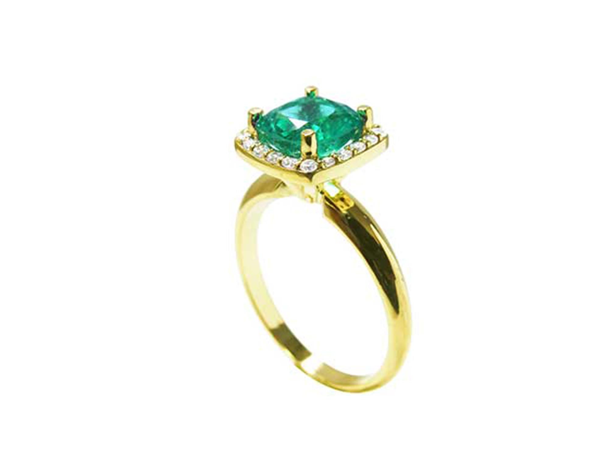A yellow gold emerald cushion cut ring on its half side profile view from the top to the band.