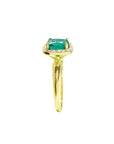 1.45 ct natural cushion-cut emerald ring with diamond halo in 14K gold.