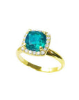 14K gold ring with a cushion-cut emerald and diamond halo.
