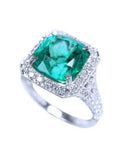 This brides' emerald ring cushion cut white hold 18k, displays the top and side profile.