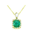 Gold necklace with a cushion cut natural colombian emerald pendant with a halo diamond, topside view.