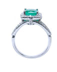 The lateral side of this colombian emerald ring displays the top setting, gallery and band ring.