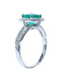 This underside vista in this emerald ring shows the top setting, gallery and split shank with band.