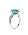 This underside vista in this emerald ring shows the top setting, gallery and split shank with band.