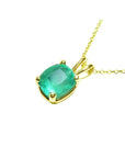 Natural 2.88 ct cushion-cut emerald solitaire pendant in 14K yellow gold with a four-prong setting.