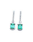 Pair of natural emerald dangle earrings with diamond accents in 18k white gold, front side top view