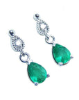 Natural colombian emerald teardrop earrings 14k white gold, top diamond studded.
