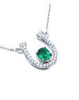 Genuine emerald horseshoe necklace with natural diamonds, crafted in 14k white gold, a lucky piece of jewelry to wear every day
