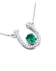 Genuine emerald horseshoe necklace with natural diamonds, crafted in 14k white gold, a lucky piece of jewelry to wear every day