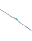 14K white gold bracelet with a rectangular Muzo Colombian emerald and diamond accents.