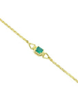 14K yellow gold solitaire bracelet with a deep green Colombian emerald.