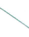 Natural Colombian emeralds tennis bracelet, 14K gold, round cut, prong set, sparkling medium deep green.