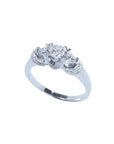14K white gold three-stone engagement ring with round cut natural diamonds and pave accents.