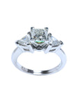 14K white gold ring with a princess cut diamond center and trillion side diamonds.