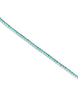 Colombian emerald tennis bracelet with round cut green emeralds in 14K white gold.