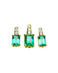 Front position of a trio set of emerald earrings and pendant, accent diamonds in 14k yellow gold, full top side view