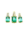A trio set of a colombian emerald earrings and pendant, accent diamonds in 14k yellow gold.