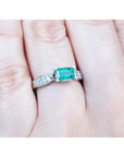A colombian emerald ring with diamonds in white gold for mother's day gift.