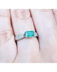 A colombian emerald ring with diamonds in white gold for mother's day gift.