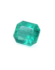 Natural square emerald from the Muzo mines Colombia, left side table and crown visibles