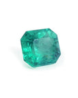 Natural square emerald from the Muzo mines Colombia, boasts a bright medium green hue and crystalline clarity.