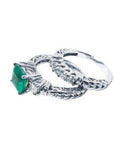 1.48 ct. emerald engagement ring with diamond wedding band in 14K white gold.
