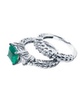 1.48 ct. emerald engagement ring with diamond wedding band in 14K white gold.