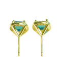 A pair of halo diamond emerald stud earrings, downside view push backs system.