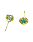 Pair of 1.55 carat emerald stud earrings with halo diamonds set in 14K yellow gold.