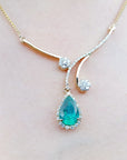 Women's necklace emerald and diamonds, sourced from the Muzo mines in Colombia a natural pear cut set in 18k yellow gold